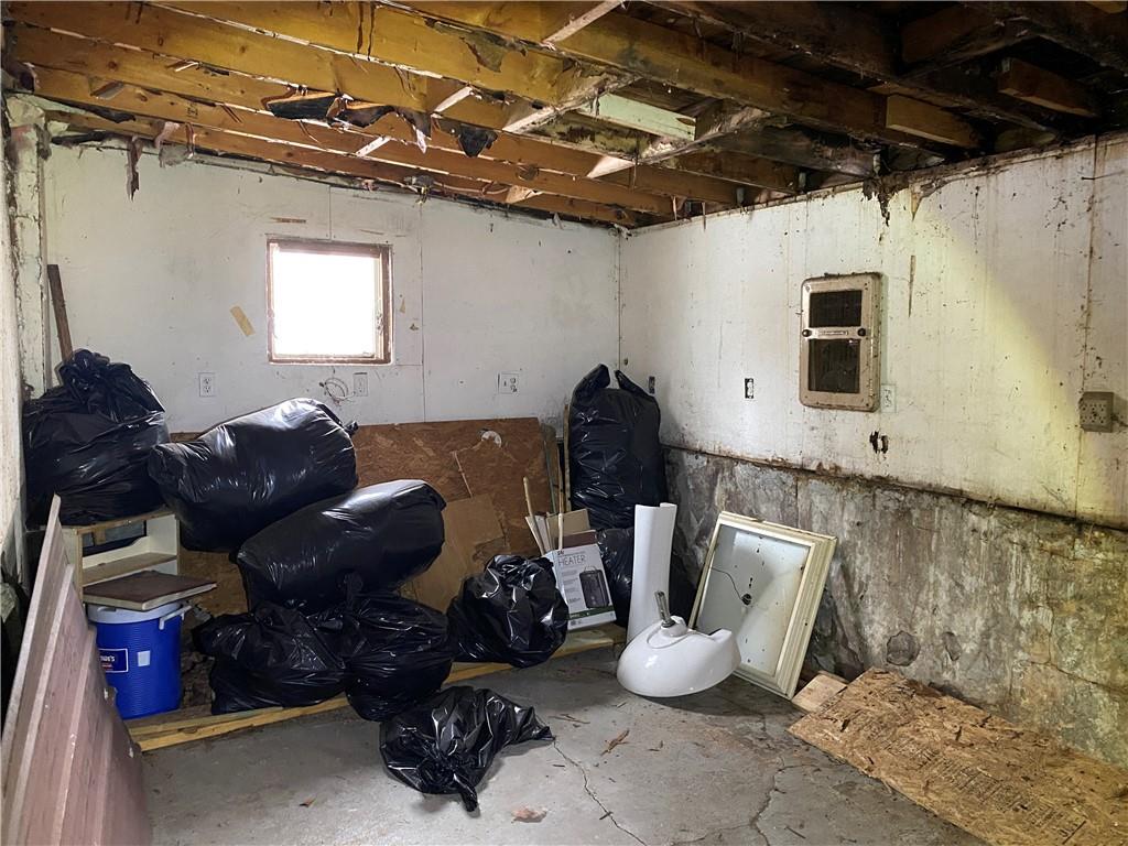 97 Frazier Avenue McKees Rocks, PA 15136 - Photo 6 of 13 a room with lots of furniture and other items
