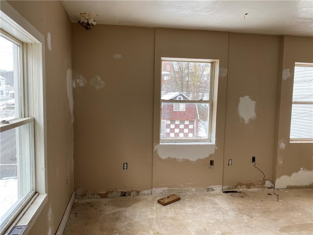 97 Frazier Avenue McKees Rocks, PA 15136 - Photo 8 of 13 a view of a room with window