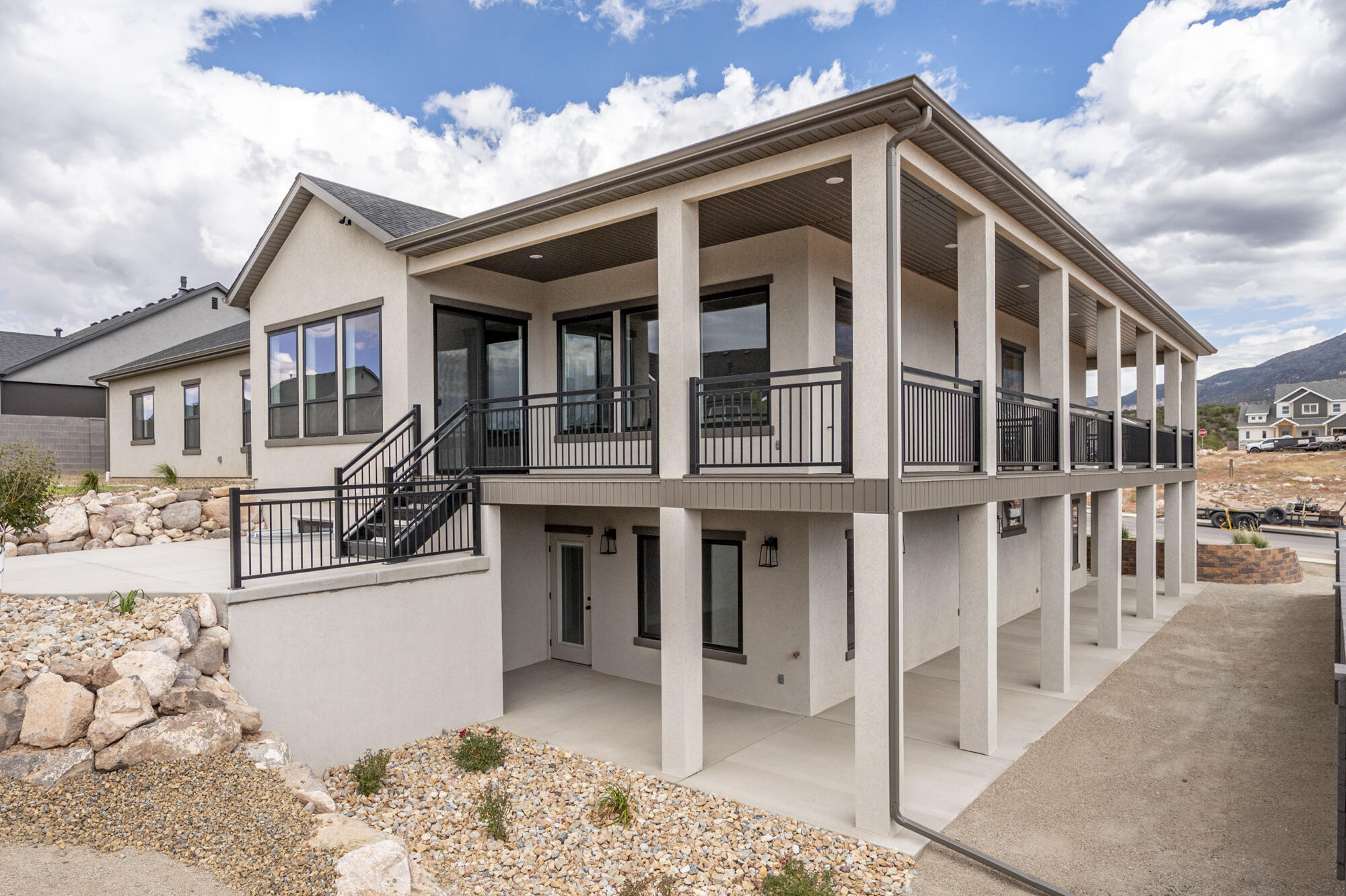 1852 South Hidden Canyon Road Cedar City, UT 84720 - Photo 62 of 79 The wrap-around deck extends the living space outdoors and creates multiple places to relax, entertain, and take in the surrounding mountain and valley views.