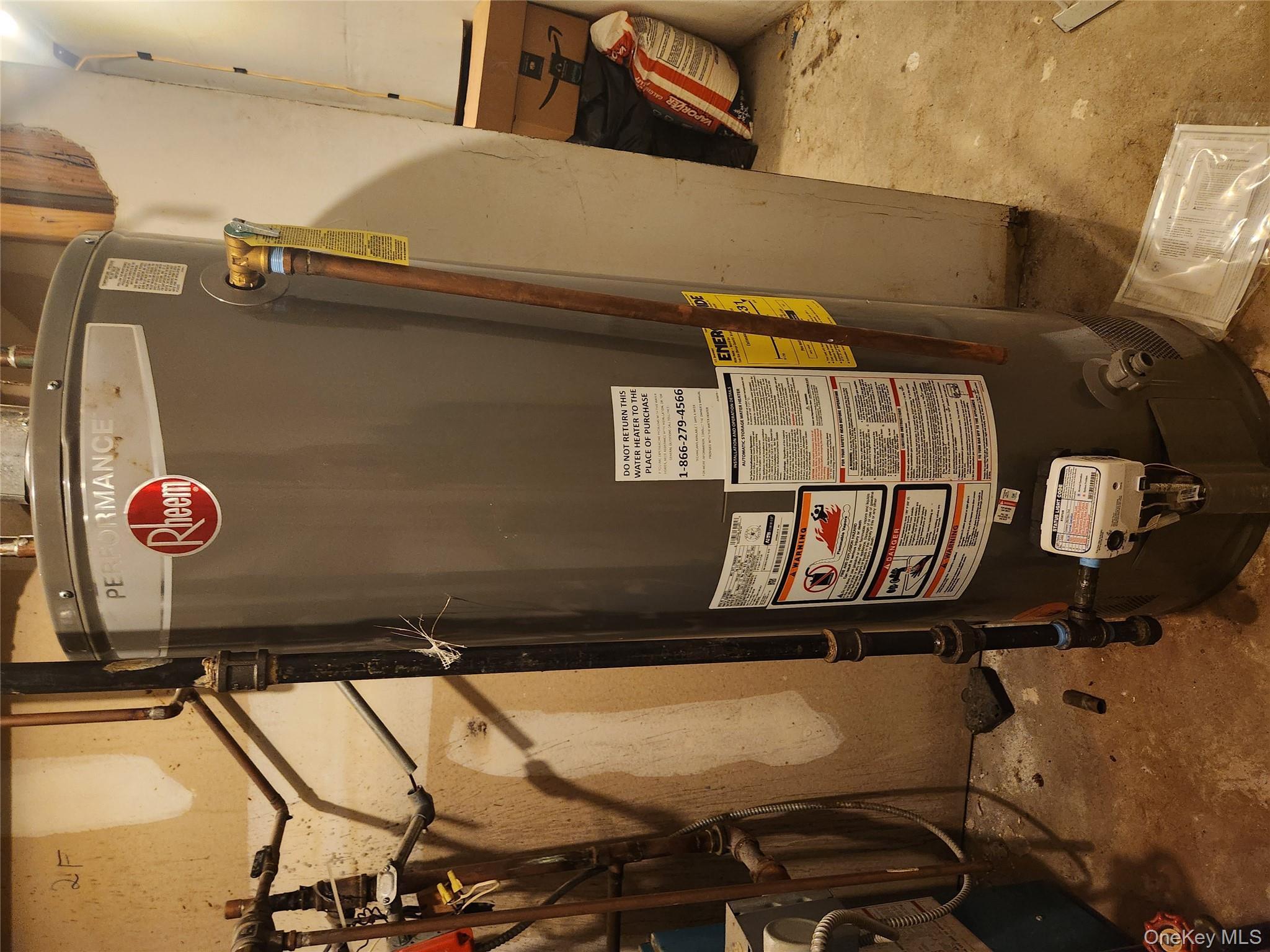 142-34 Bascom Avenue Queens, NY 11436 - Photo 16 of 21 Utilities with water heater