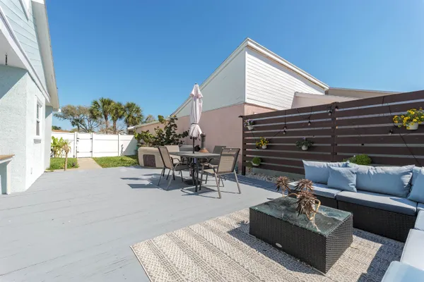 a building outdoor space with patio furniture