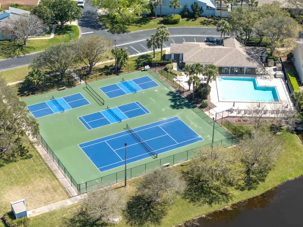 a view of a backyard with sitting area