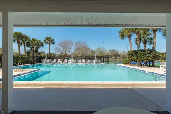 a view of a living room and front door