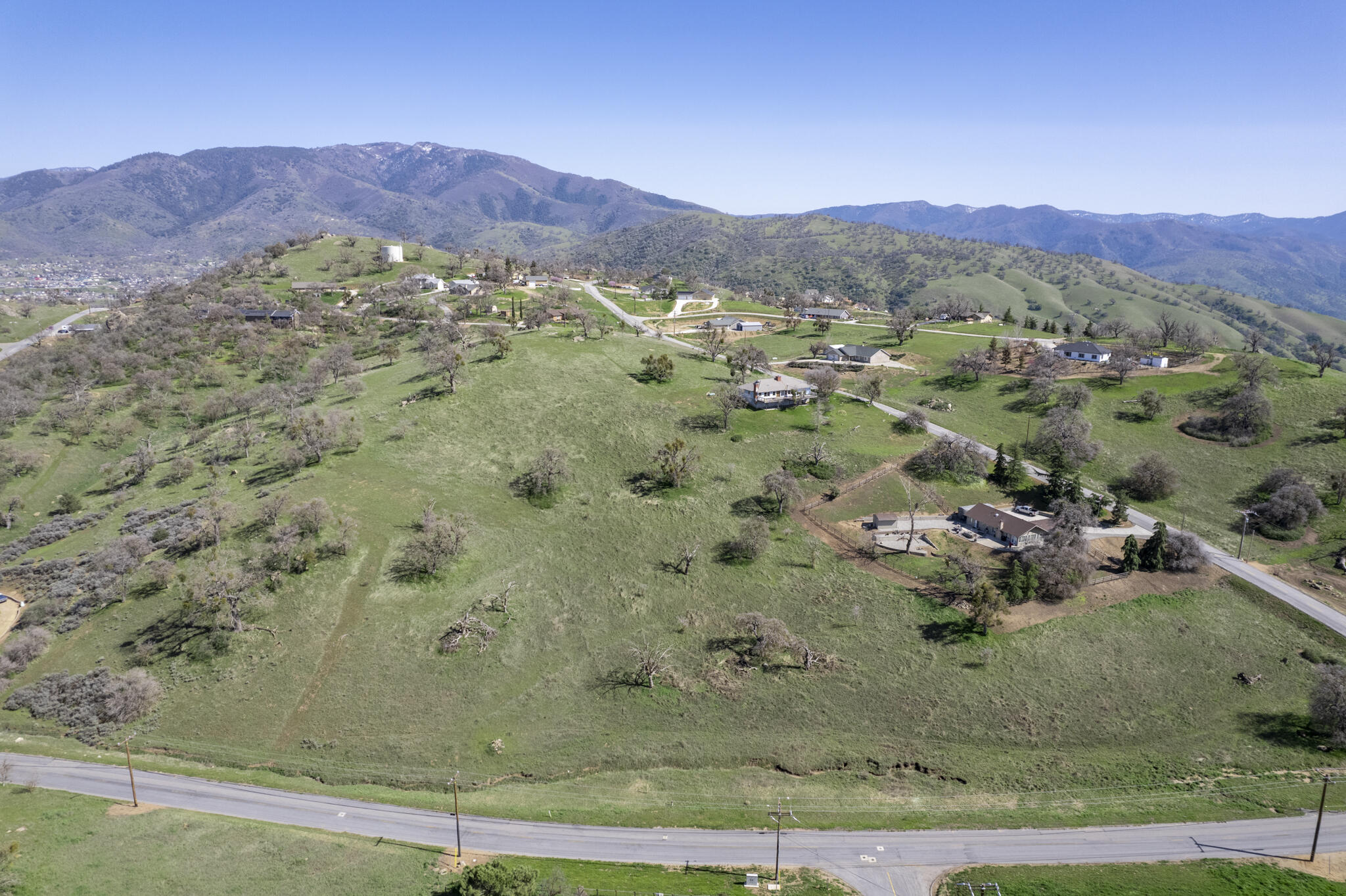 a view of a city with mountains in the background