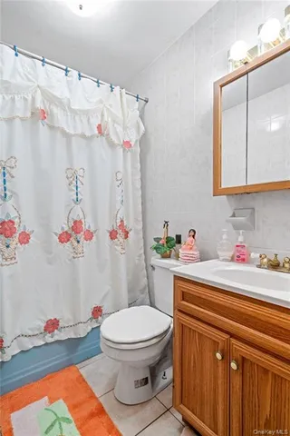a bathroom with a toilet and a sink