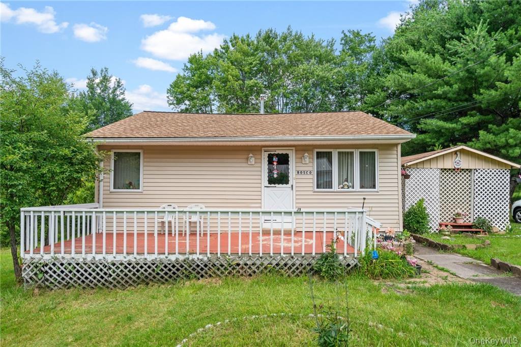 6 Leonard Road Monticello, NY 12701 - Photo 24 of 35 a front view of a house with a garden