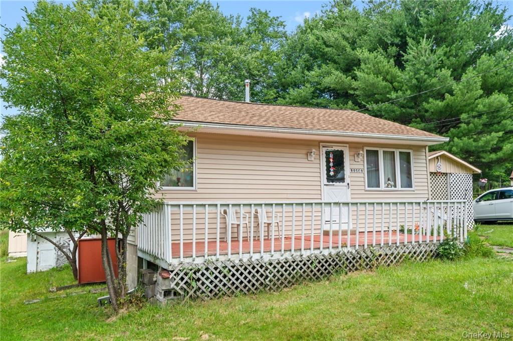 6 Leonard Road Monticello, NY 12701 - Photo 25 of 35 a front view of a house with a garden