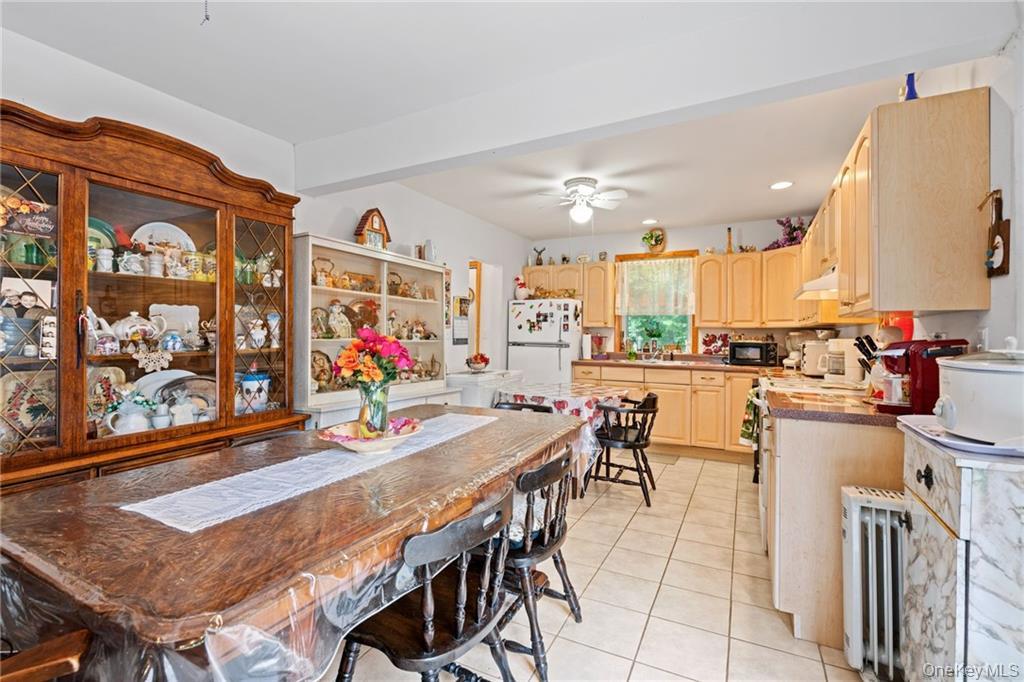 6 Leonard Road Monticello, NY 12701 - Photo 8 of 35 a view of a dining room with furniture window and wooden floor