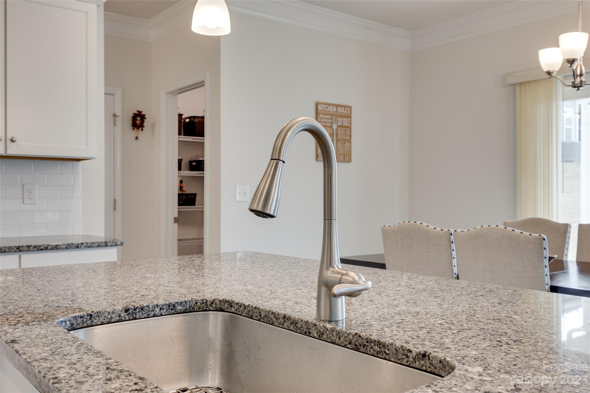 8013 Oakmere Road Waxhaw, NC 28173 - Photo 13 of 30 a bathroom with a granite countertop sink and a mirror