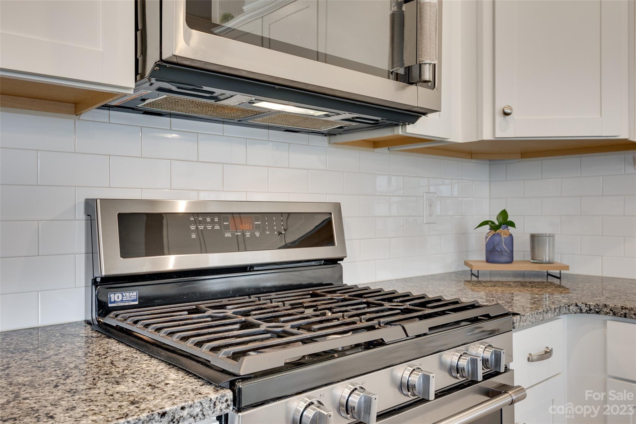 8013 Oakmere Road Waxhaw, NC 28173 - Photo 14 of 30 a stove top oven sitting inside of a kitchen
