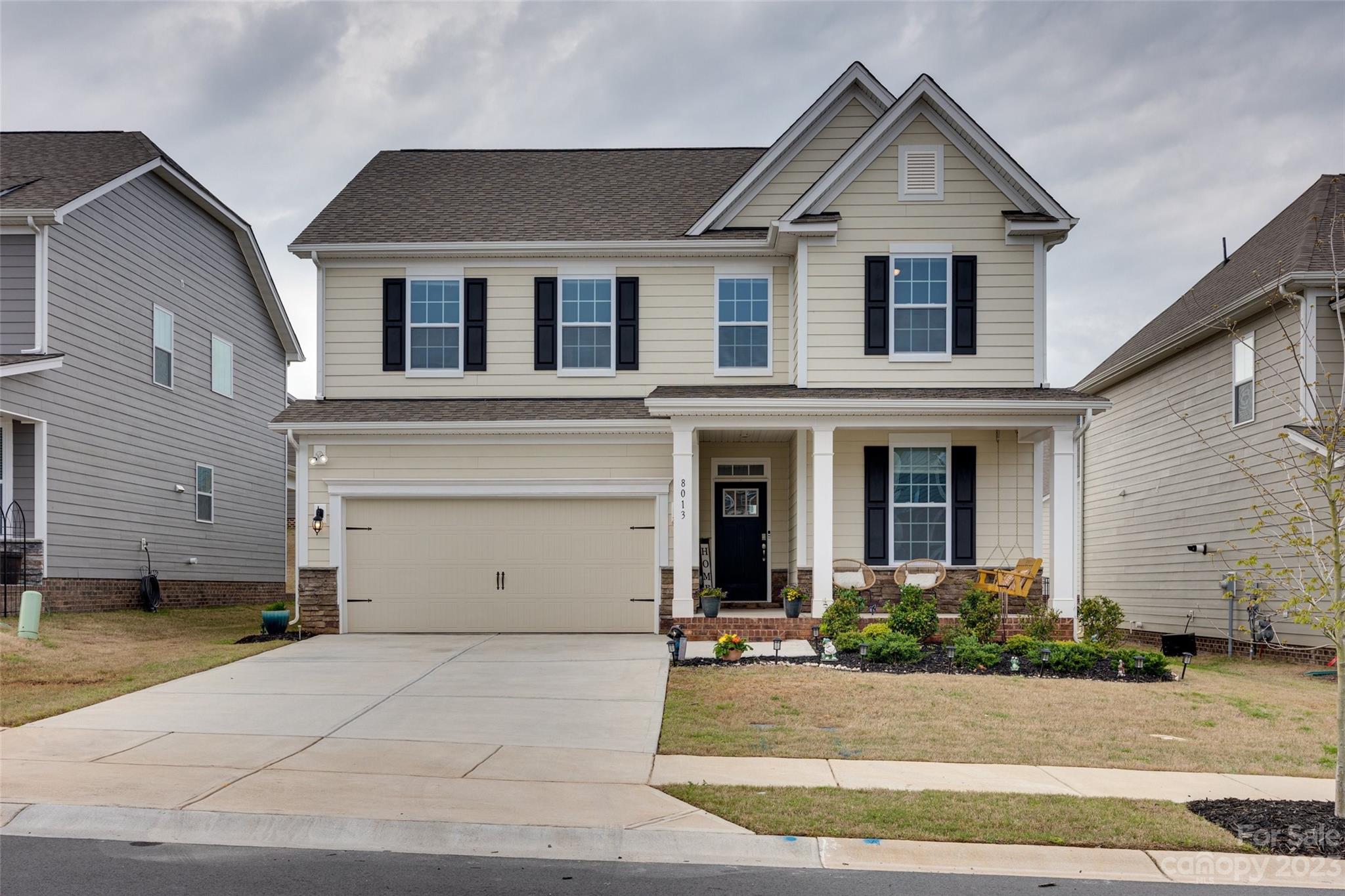 8013 Oakmere Road Waxhaw, NC 28173 - Photo 2 of 30 a view of a white house with a street