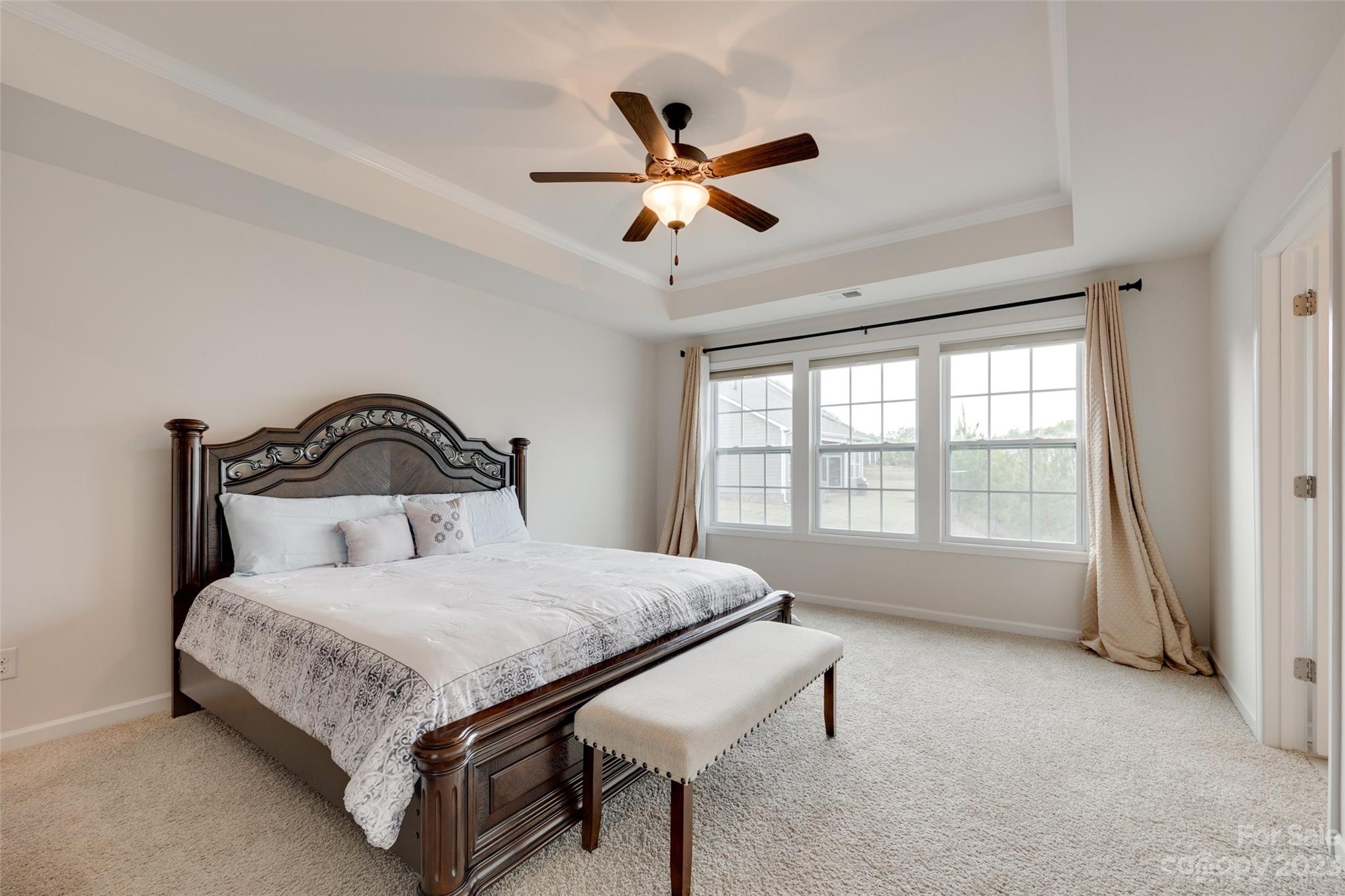 8013 Oakmere Road Waxhaw, NC 28173 - Photo 22 of 30 a bedroom with a bed and window