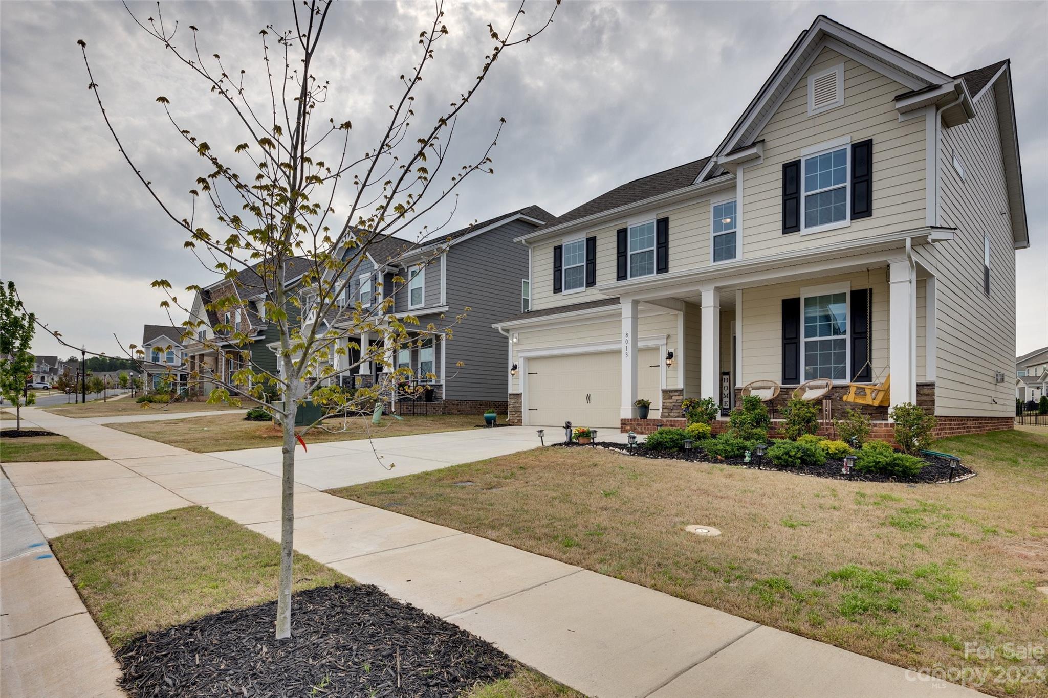 8013 Oakmere Road Waxhaw, NC 28173 - Photo 30 of 30 a front view of a house with garden
