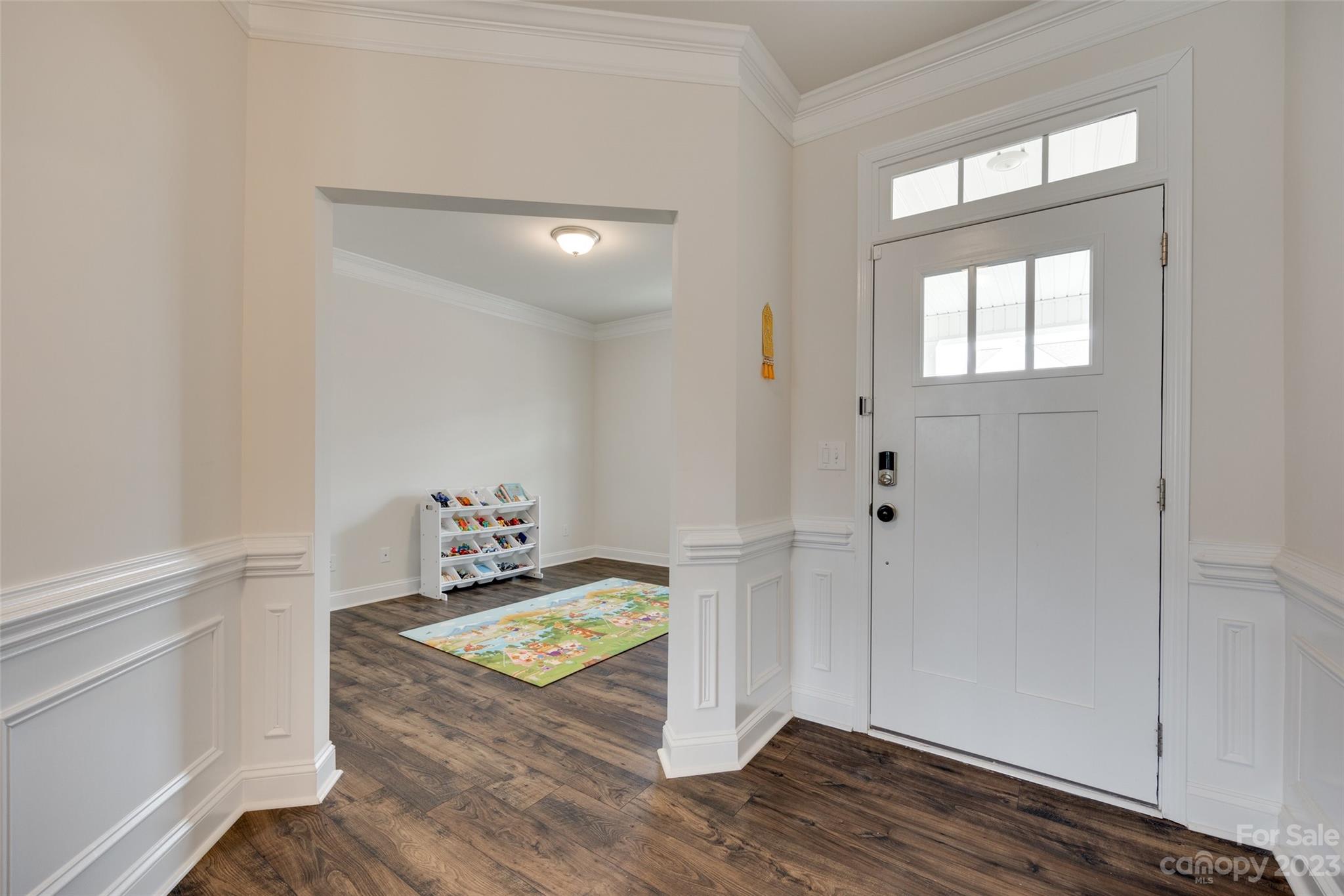 8013 Oakmere Road Waxhaw, NC 28173 - Photo 4 of 30 a view of an entryway with wooden floor