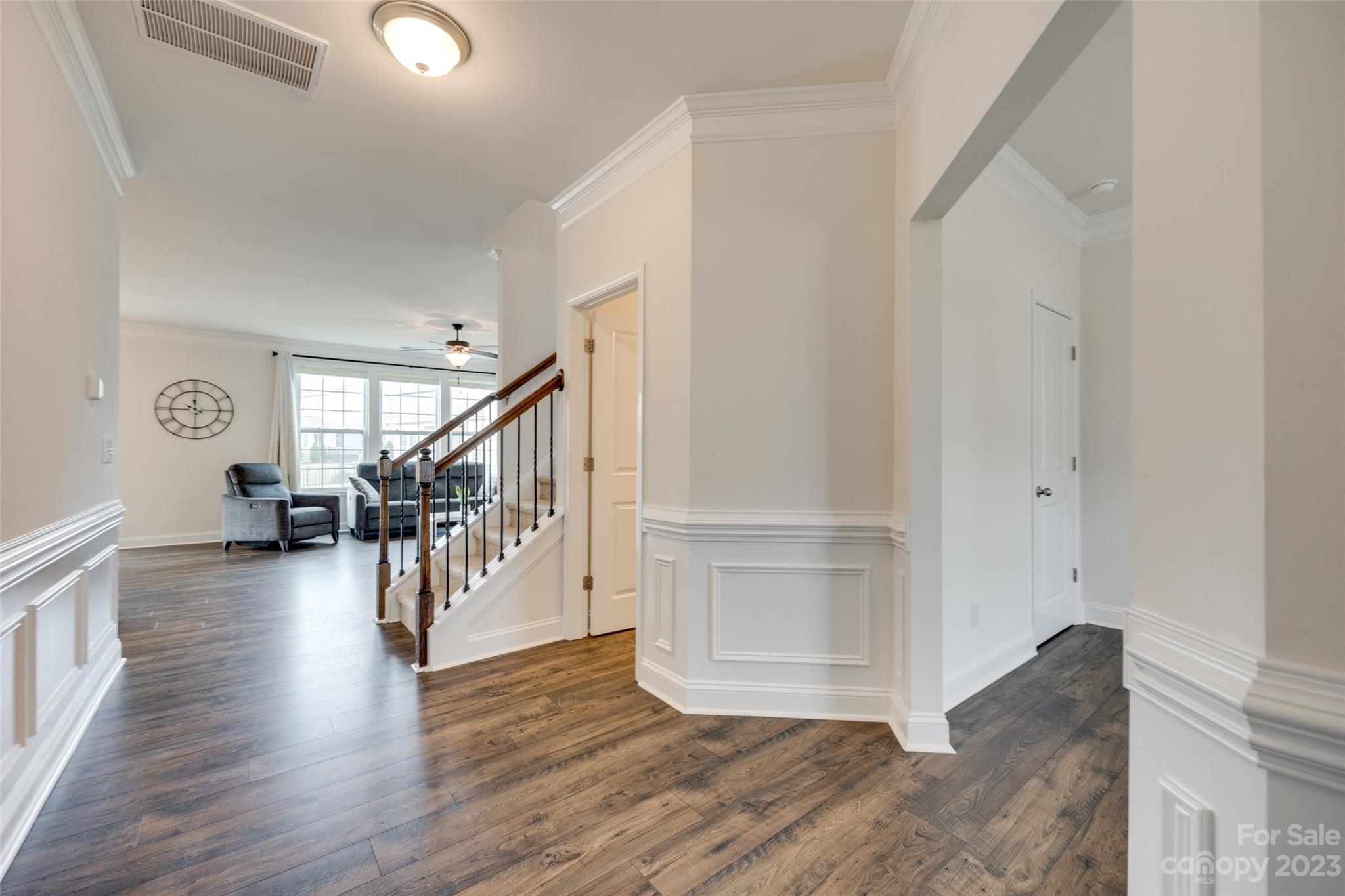 8013 Oakmere Road Waxhaw, NC 28173 - Photo 6 of 30 a view of entryway and hall with wooden floor