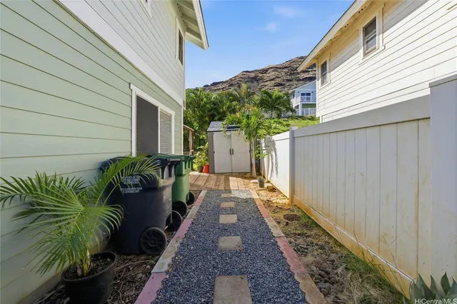 a view of a backyard with plants
