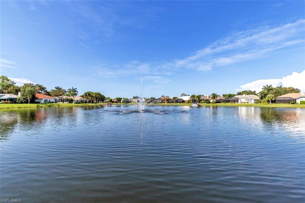 11774 Longshore Way West Naples, FL 34119 - Photo 35 of 35 a view of an ocean with boats and trees in the background