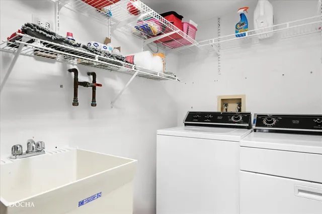 a utility room with dryer and washer