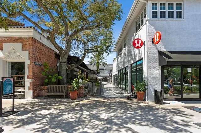 a view of a street with sitting area