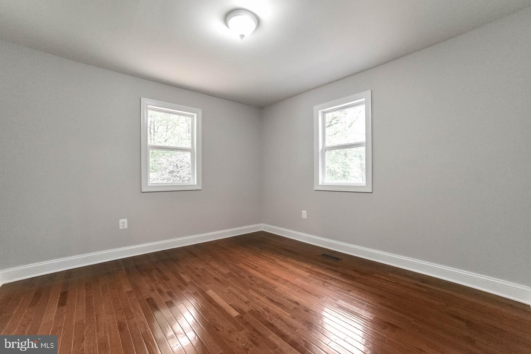 8745 Gunston Road Welcome, MD 20693 - Photo 22 of 38 Bedrm #2 - bright windows & overhead lighting!
