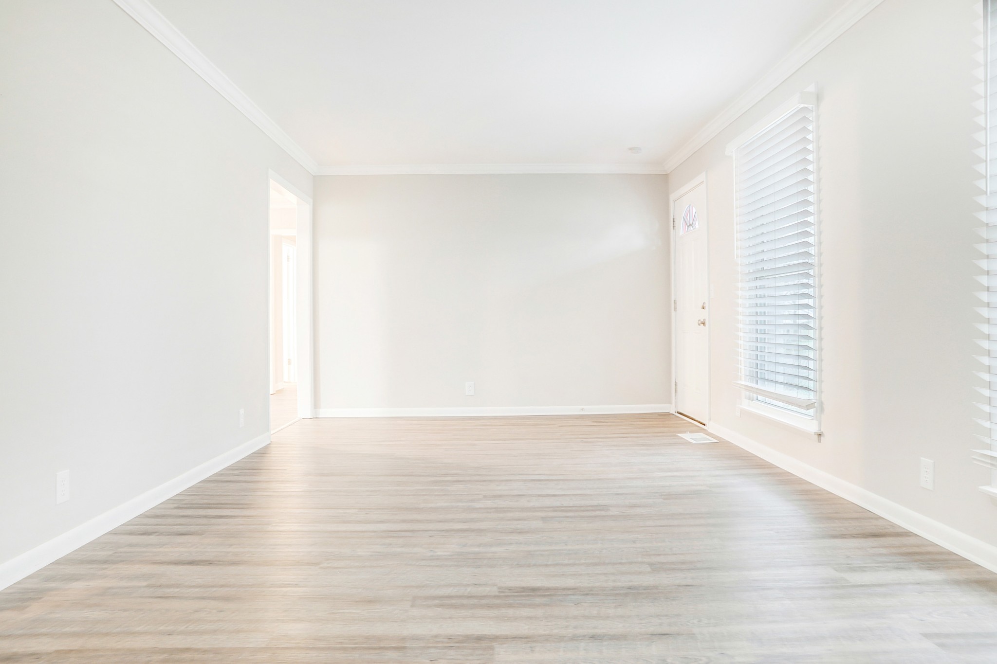 1320 Cheyenne Boulevard Madison, TN 37115 - Photo 19 of 26 a view of an empty room with wooden floor and a window