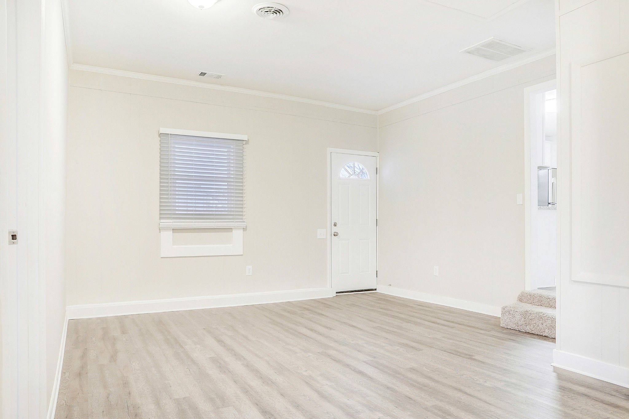 1320 Cheyenne Boulevard Madison, TN 37115 - Photo 20 of 26 an empty room with wooden floor and windows