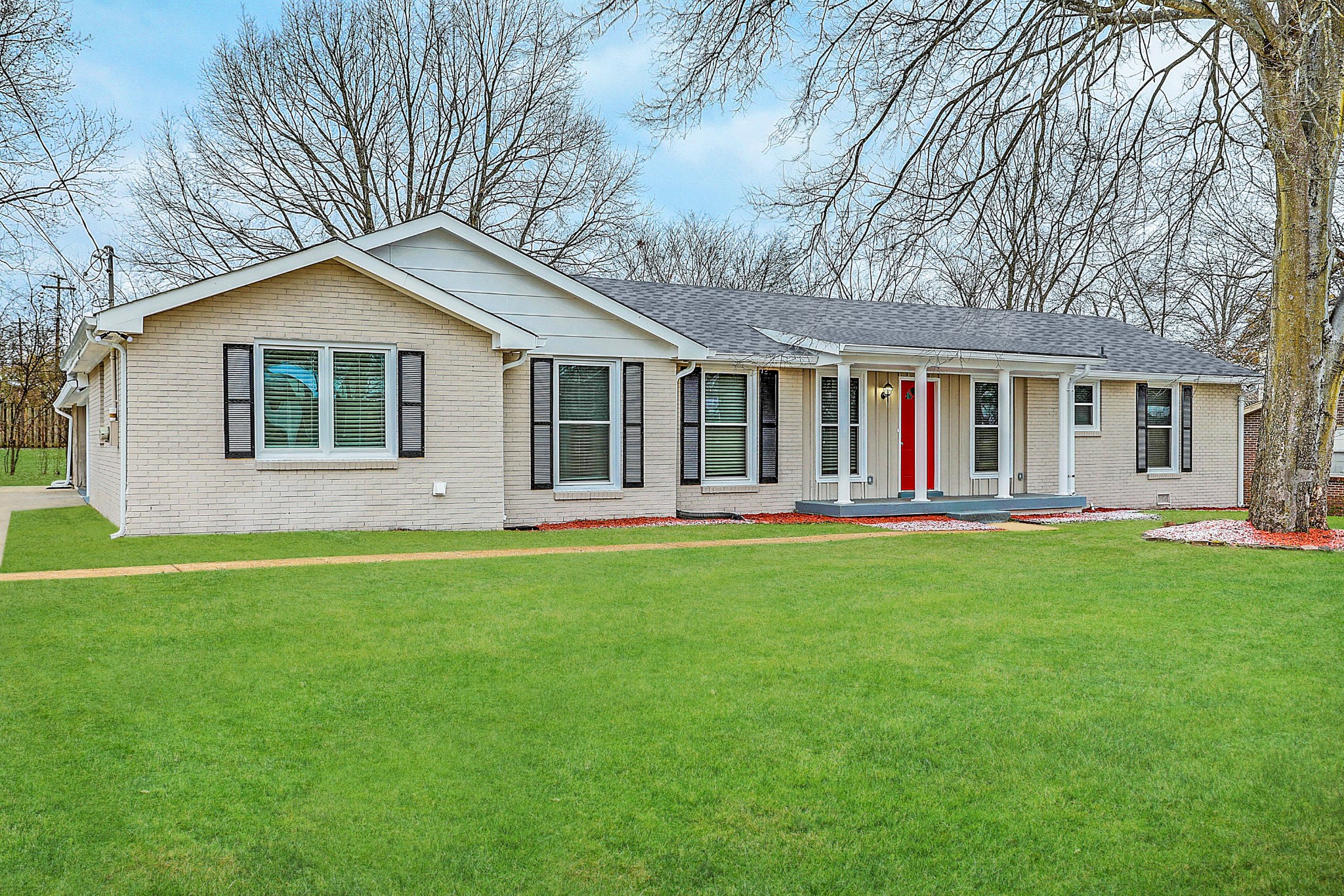 1320 Cheyenne Boulevard Madison, TN 37115 - Photo 4 of 26 a view of a house with backyard and garden