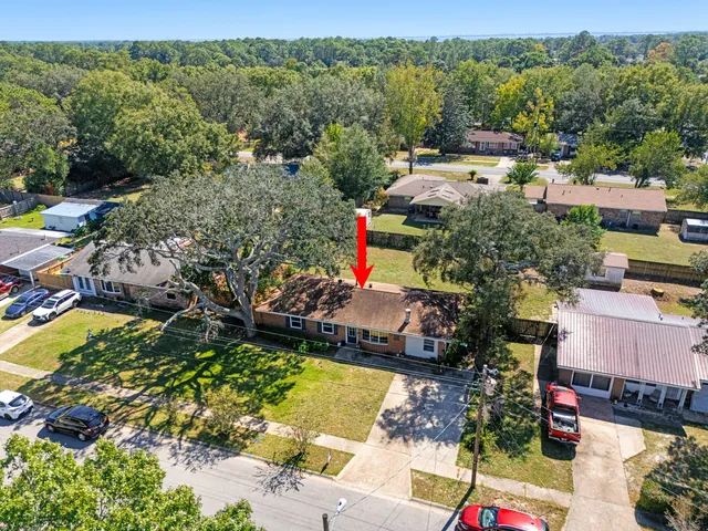 a bathroom with a sink and a large mirror