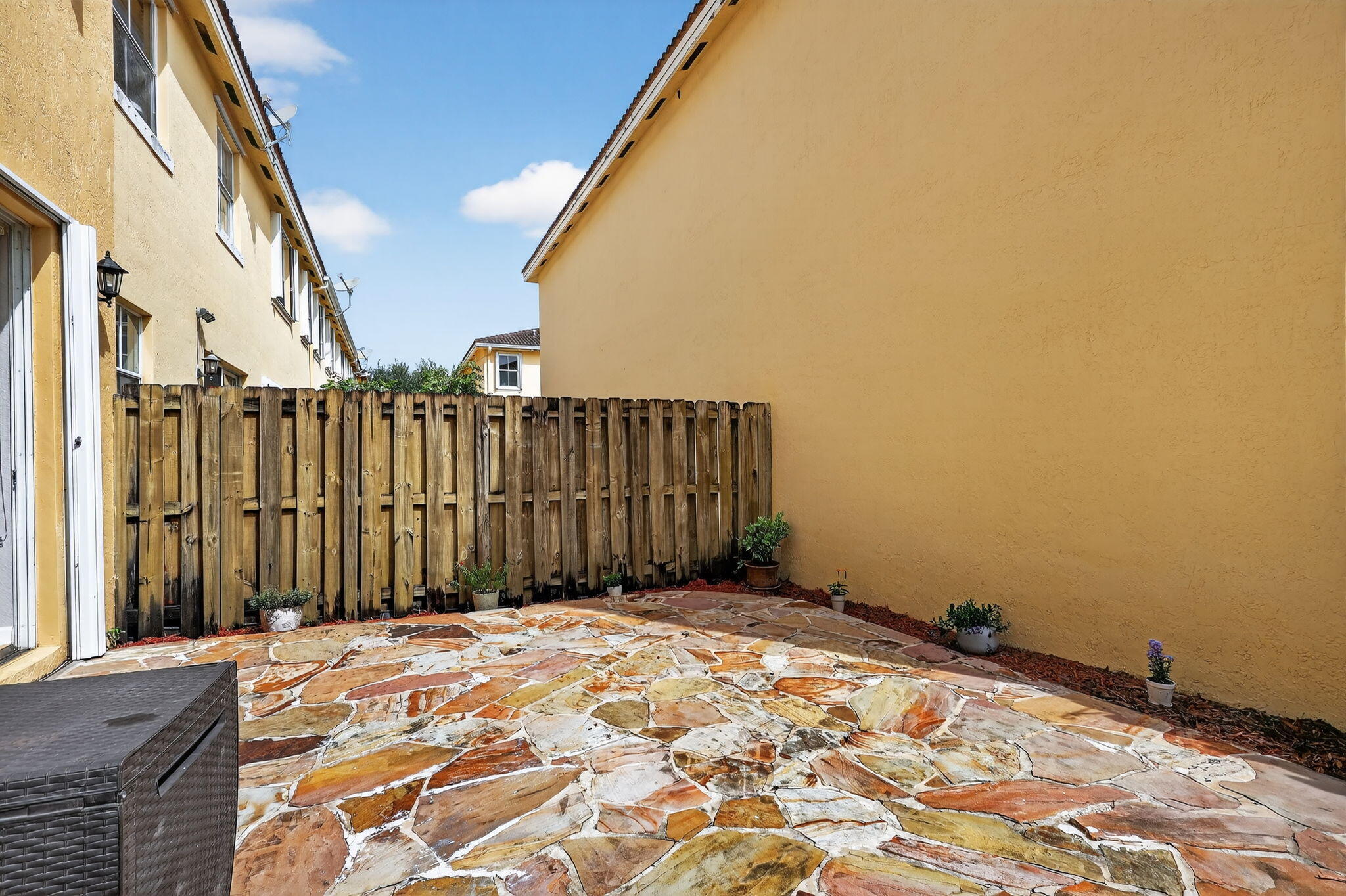 913 Southwest 151 Place Miami, FL 33194 - Photo 12 of 48 a view of wooden fence