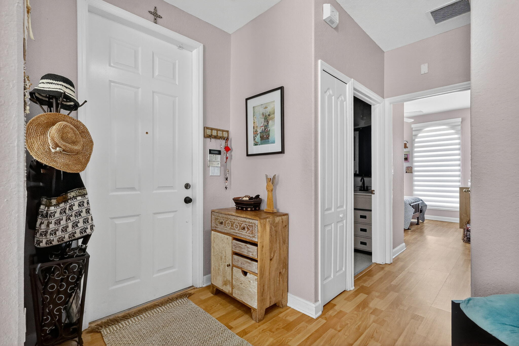 913 Southwest 151 Place Miami, FL 33194 - Photo 21 of 48 a view of a hallway with closet and wooden floor