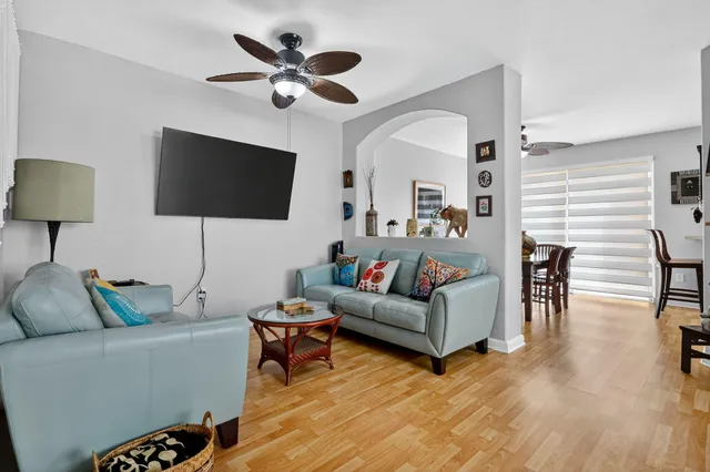 a bedroom with a bed and a table