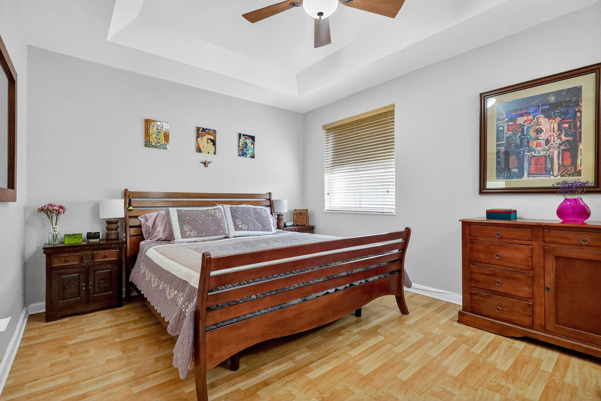 913 Southwest 151 Place Miami, FL 33194 - Photo 28 of 48 a bedroom with a bed and a chandelier