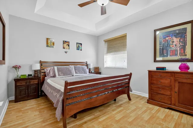 a bathroom with a toilet a sink and a mirror