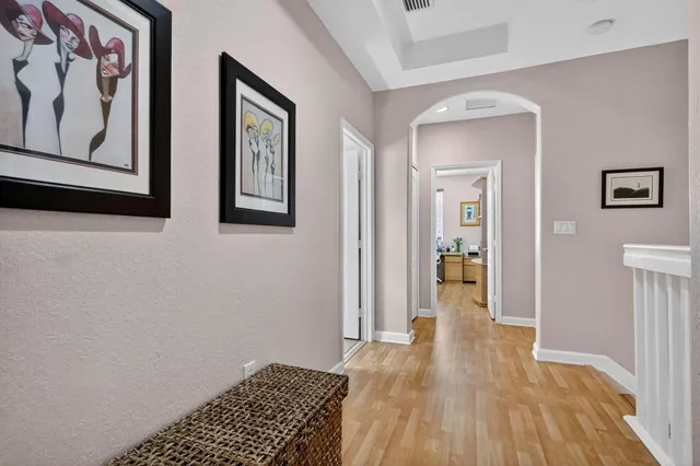 a bathroom with a toilet and a shower curtain