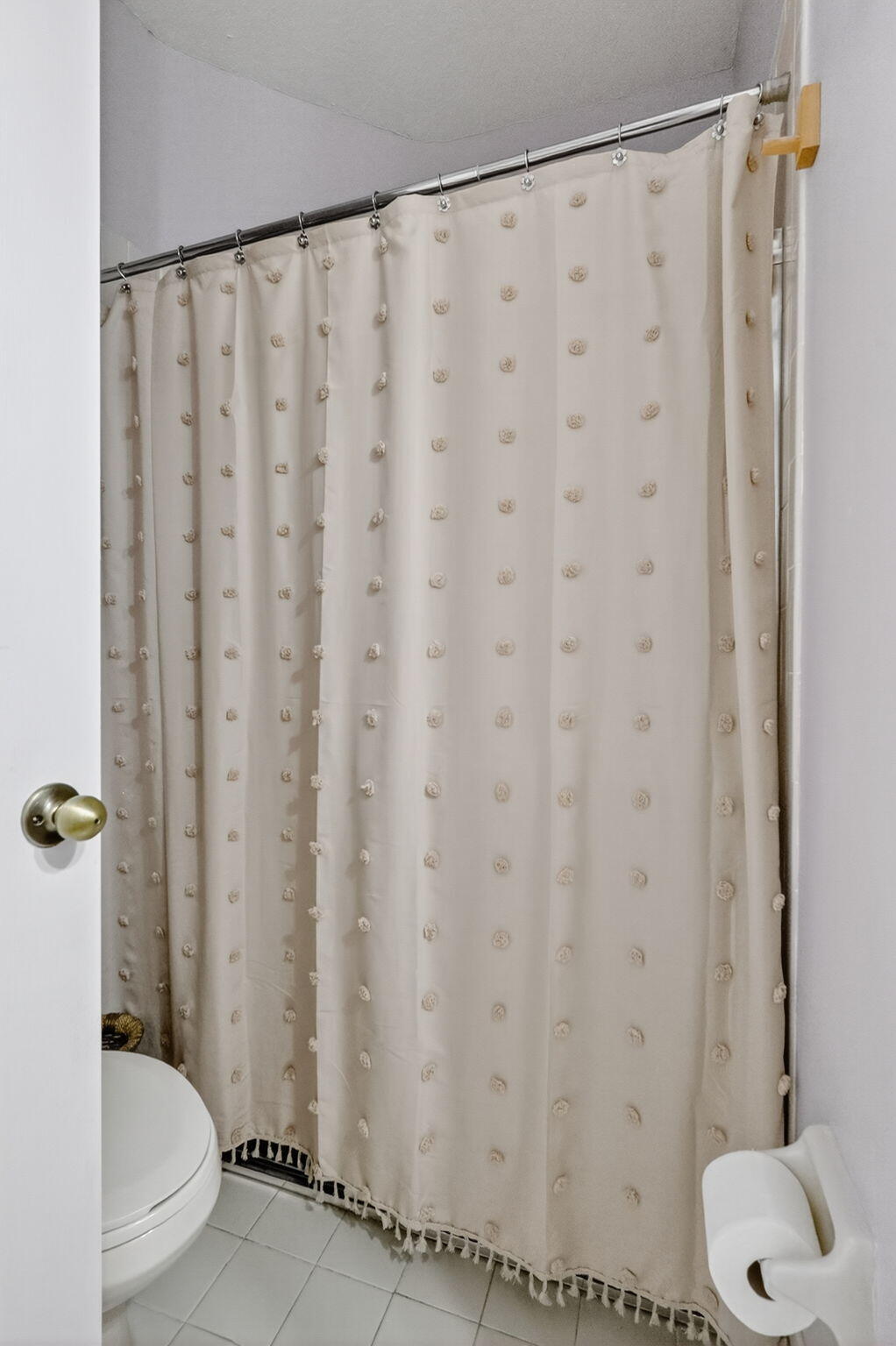 913 Southwest 151 Place Miami, FL 33194 - Photo 33 of 48 a bathroom with a shower curtain and a toilet