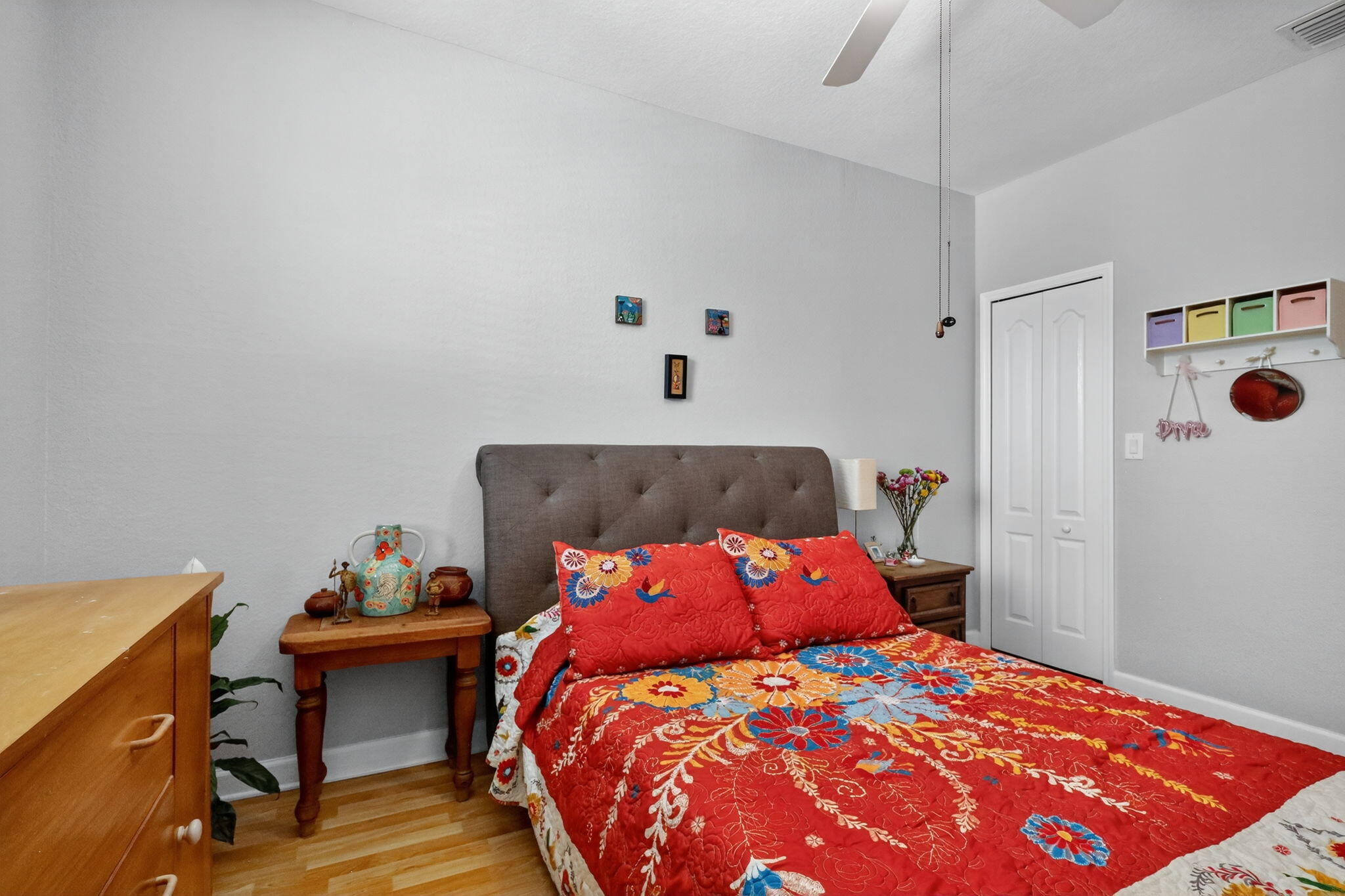 913 Southwest 151 Place Miami, FL 33194 - Photo 40 of 48 a bedroom with a bed and a table in it