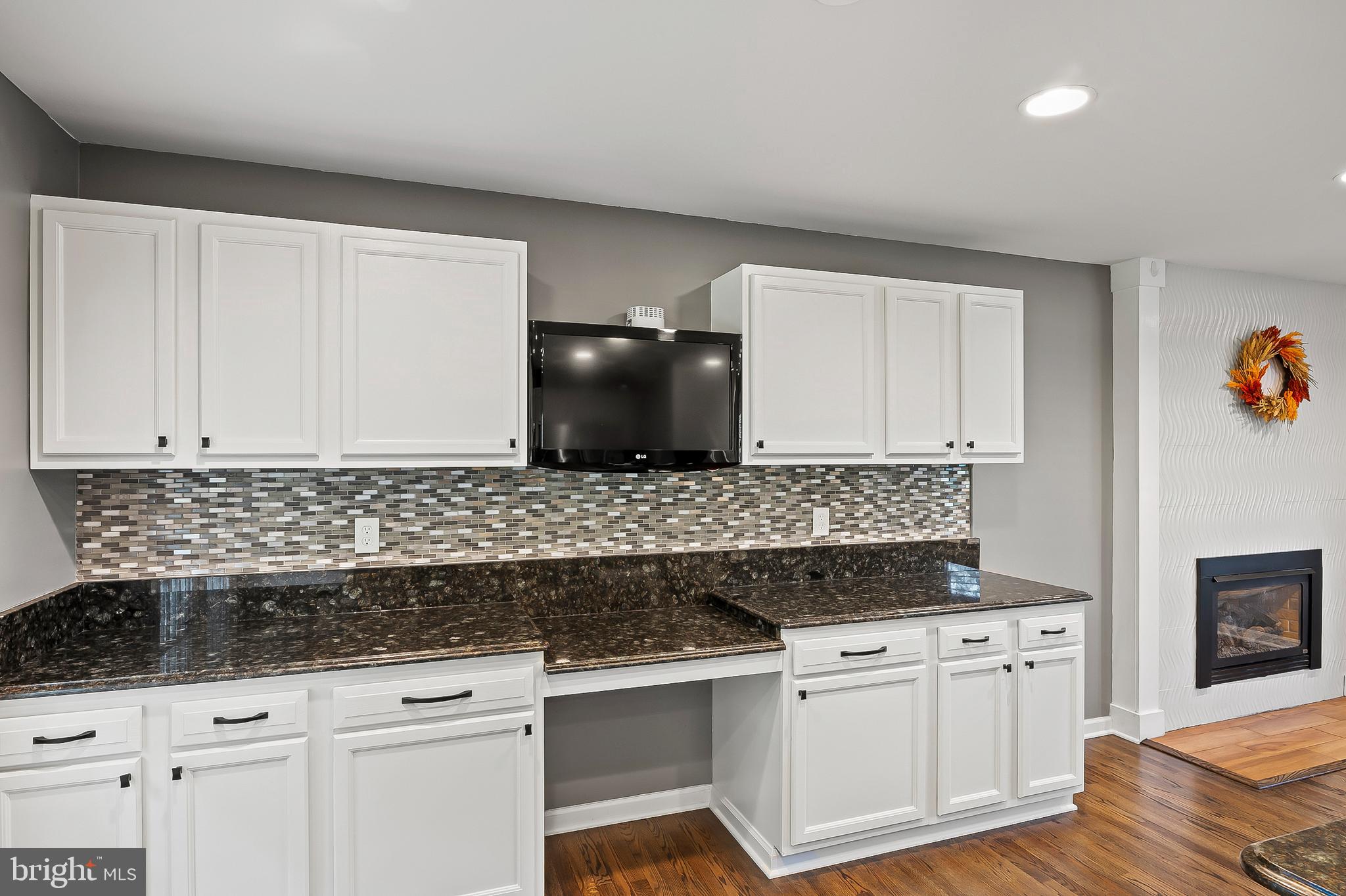 1811 Underwood Road Gambrills, MD 21054 - Photo 23 of 46 a kitchen with white cabinets and appliances