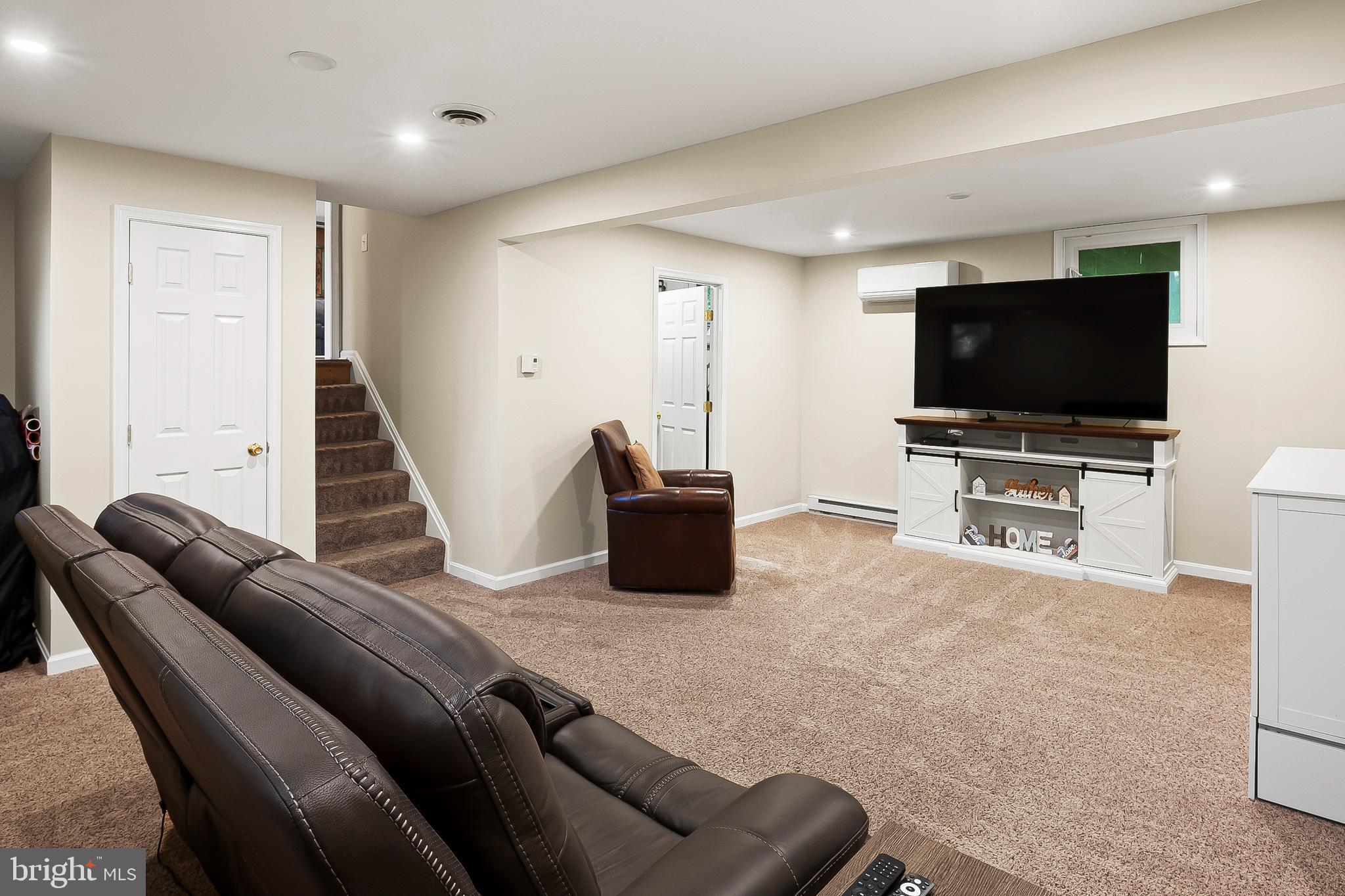 1811 Underwood Road Gambrills, MD 21054 - Photo 35 of 46 a living room with furniture and a flat screen tv