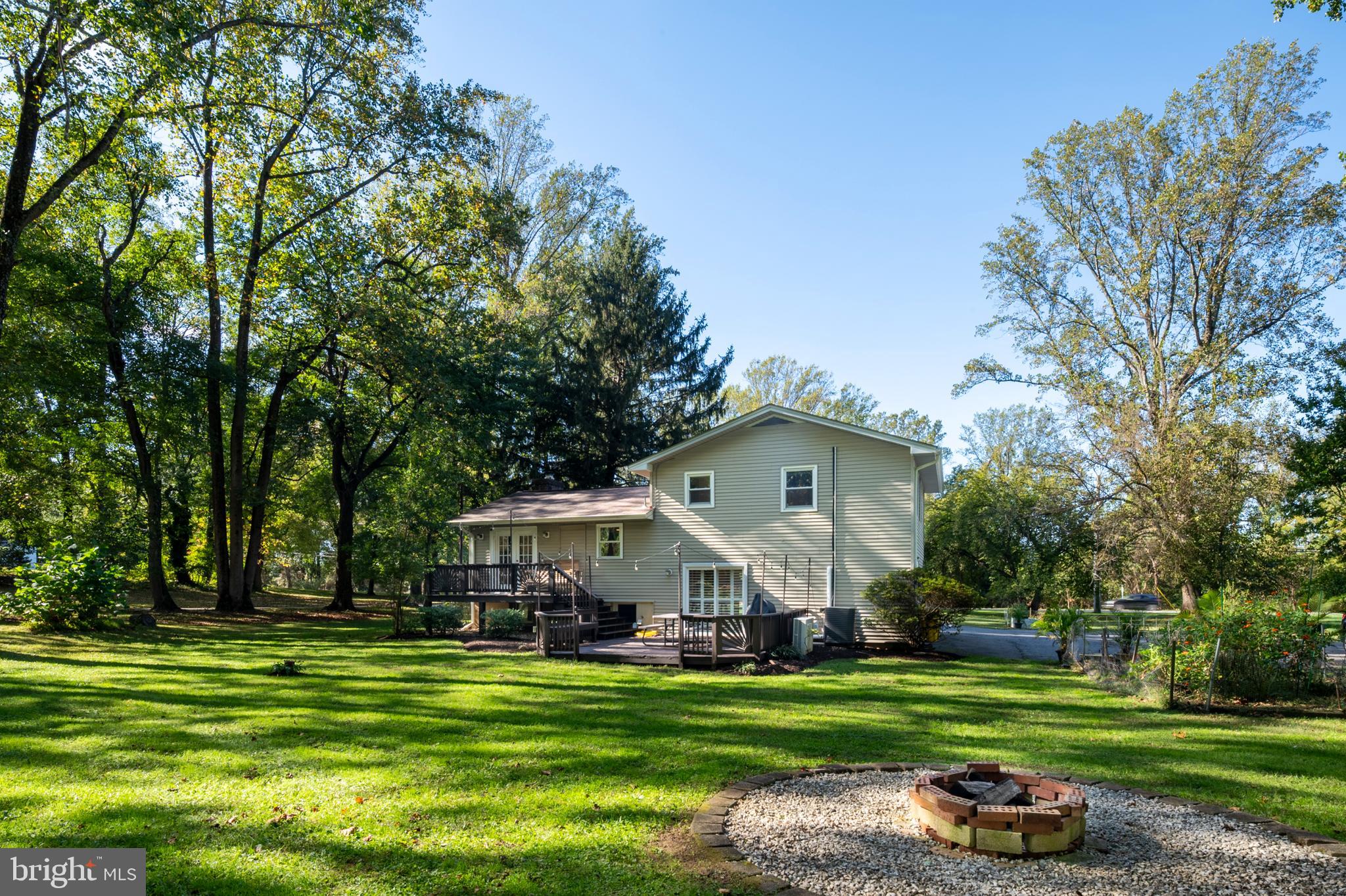 1811 Underwood Road Gambrills, MD 21054 - Photo 45 of 46 a front view of a house with a yard table and chairs
