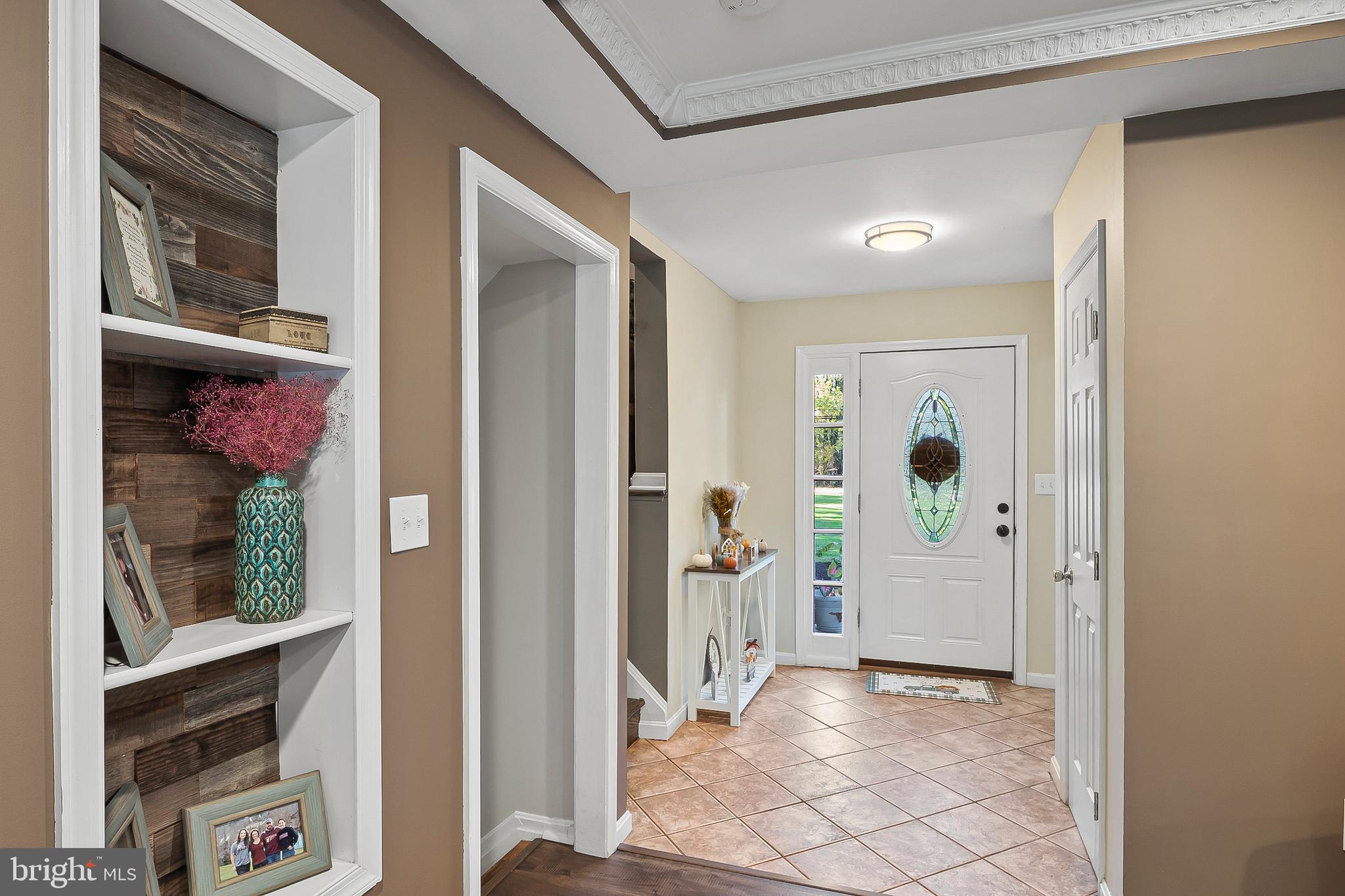 1811 Underwood Road Gambrills, MD 21054 - Photo 7 of 46 a view of a hallway with wooden shelves