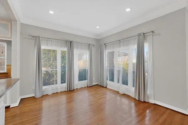 a view of entryway with wooden floor