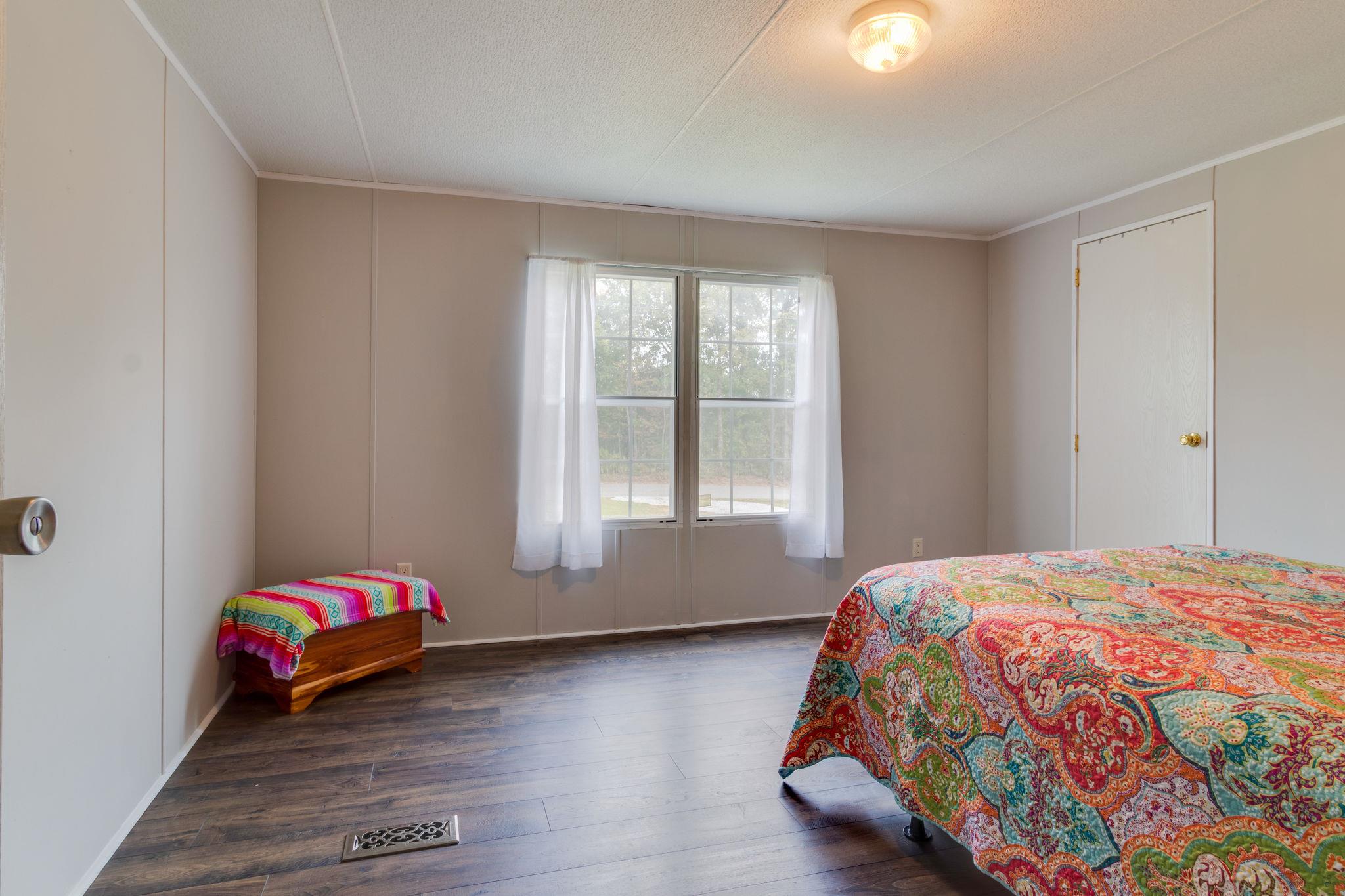 3245 Les Chappell Road Spring Hill, TN 37174 - Photo 13 of 22 a bedroom with a bed and a window