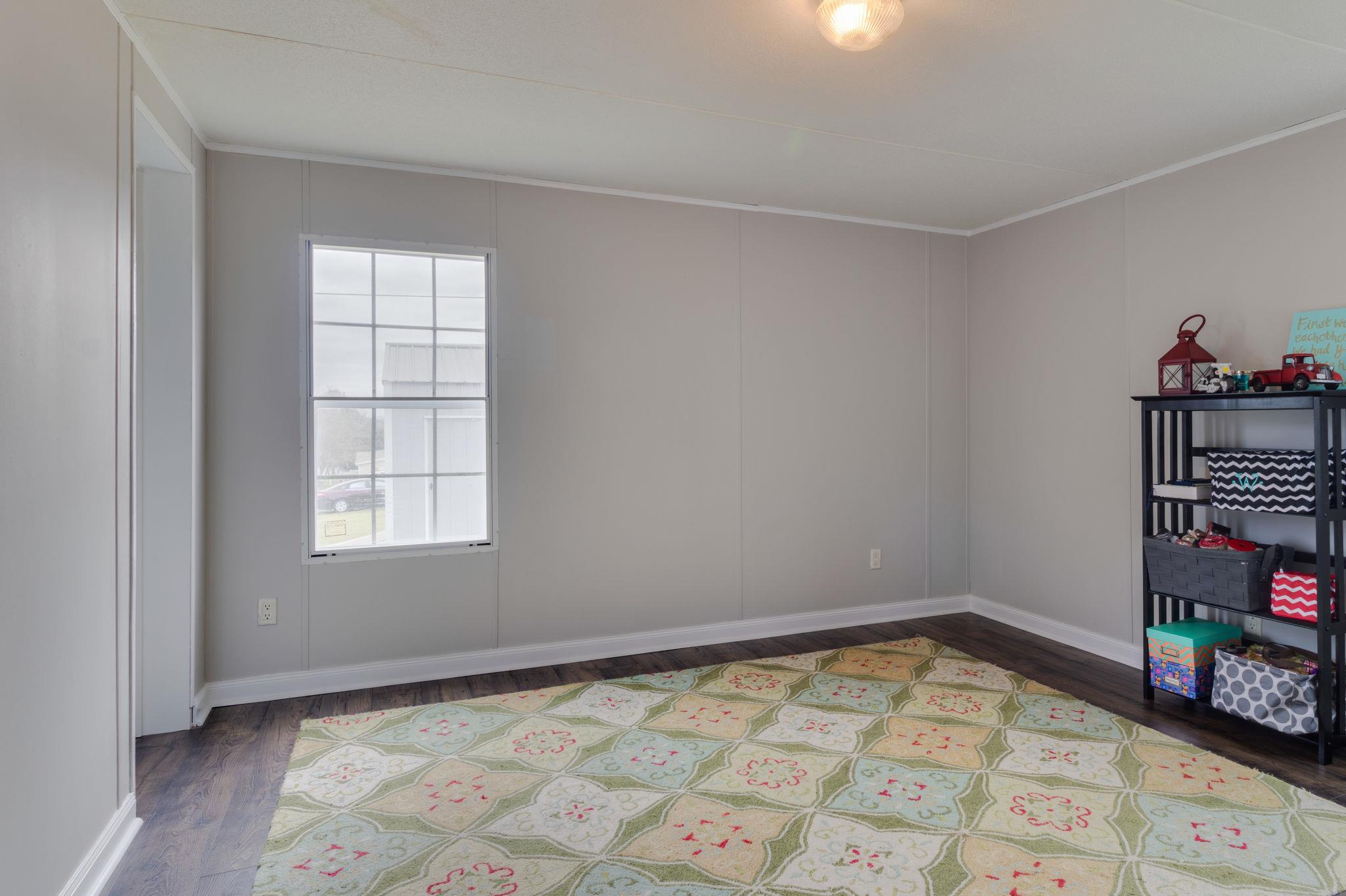 3245 Les Chappell Road Spring Hill, TN 37174 - Photo 17 of 22 an empty room with shelves