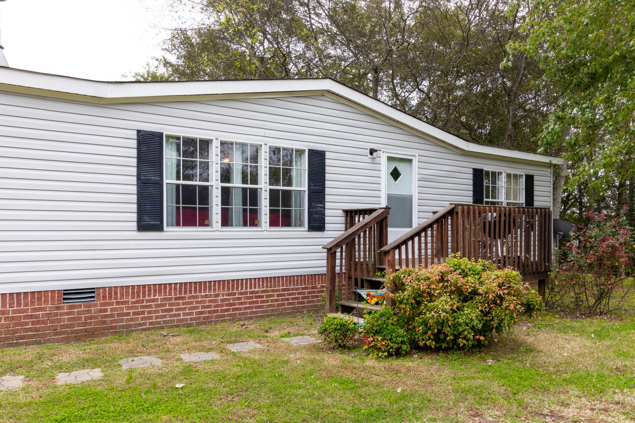 3245 Les Chappell Road Spring Hill, TN 37174 - Photo 20 of 22 a front view of a house with garden