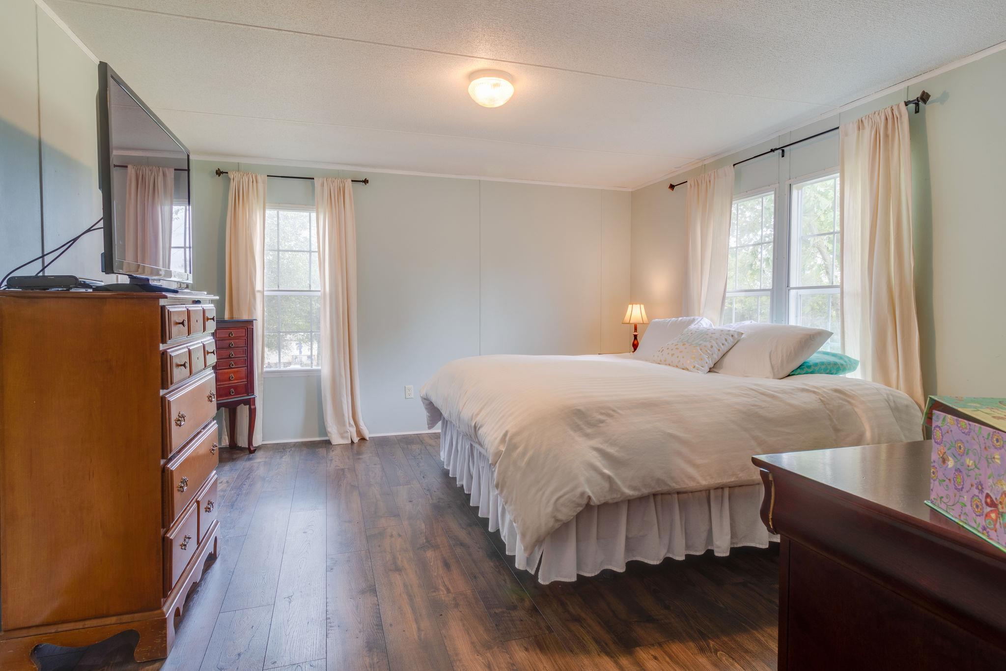 3245 Les Chappell Road Spring Hill, TN 37174 - Photo 10 of 22 a bedroom with a bed and wooden floor