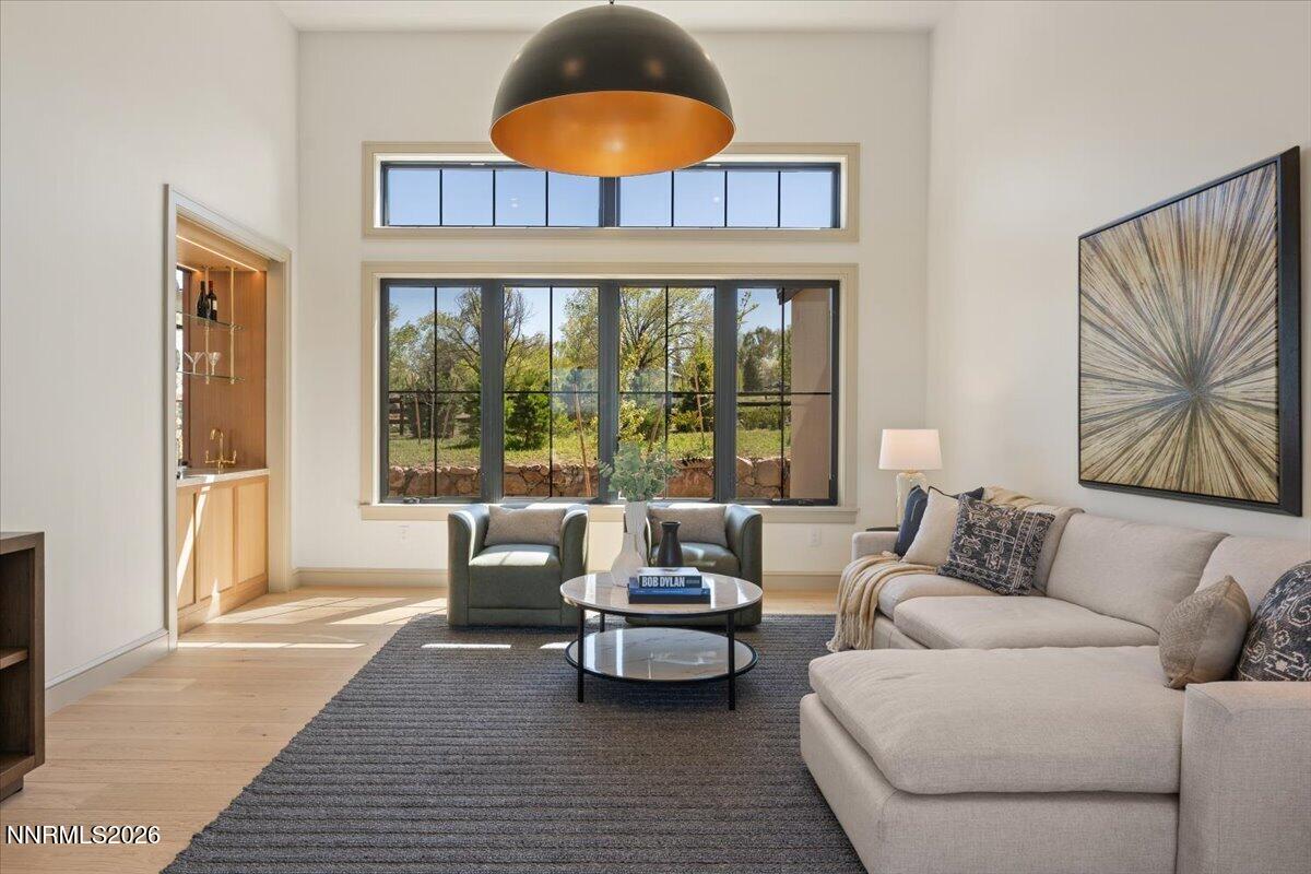 11 Glenhaven Drive Reno, NV 89511 - Photo 17 of 51 a living room with furniture and a large window