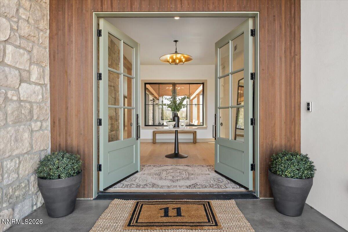 11 Glenhaven Drive Reno, NV 89511 - Photo 2 of 51 a view of an entryway with a flower garden