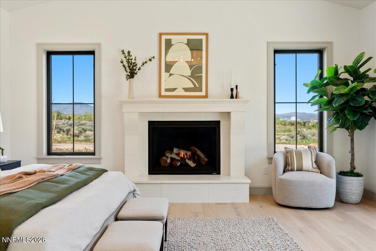 11 Glenhaven Drive Reno, NV 89511 - Photo 24 of 51 a living room with furniture and a fireplace