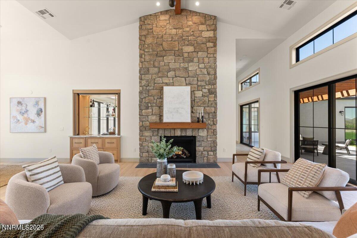11 Glenhaven Drive Reno, NV 89511 - Photo 4 of 51 a living room with fireplace furniture and a fireplace