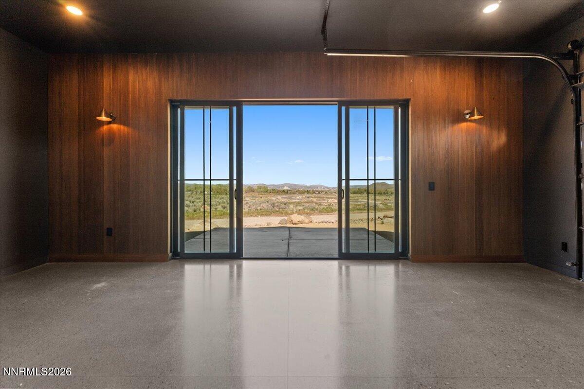 11 Glenhaven Drive Reno, NV 89511 - Photo 45 of 51 a view of an empty room with wooden floor and a window